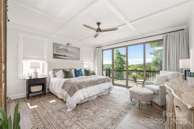 5888 Wood Duck Way, Catawba, NC 28609 - bedroom featuring coffered ceiling, access to outside, wood finished floors, a water view, and beamed ceiling
