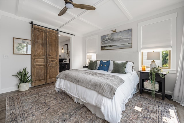 5888 Wood Duck Way, Catawba, NC 28609 - bedroom featuring a barn door, coffered ceiling, wood finished floors, beam ceiling, and connected bathroom