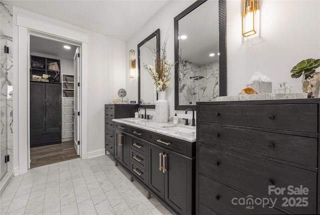 5888 Wood Duck Way, Catawba, NC 28609 - full bath featuring a marble finish shower, double vanity, marble look tile flooring, a spacious closet, and recessed lighting