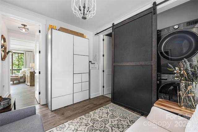 5888 Wood Duck Way, Catawba, NC 28609 - bathroom featuring stacked washer / drying machine and wood finished floors