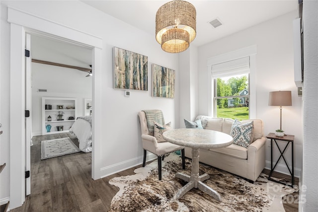 5888 Wood Duck Way, Catawba, NC 28609 - sitting room with wood finished floors and a chandelier