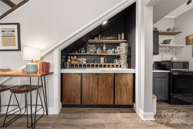 5888 Wood Duck Way, Catawba, NC 28609 - bar featuring black range with electric cooktop and wood finished floors