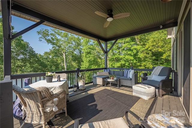 5888 Wood Duck Way, Catawba, NC 28609 - wooden deck featuring outdoor lounge area, ceiling fan, and view of scattered trees