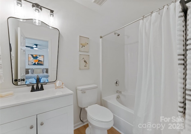 5229 Tarrywood Ln, Charlotte, NC 28205 - ensuite bathroom with toilet, shower / bath combo, vanity, a ceiling fan, and wood finished floors