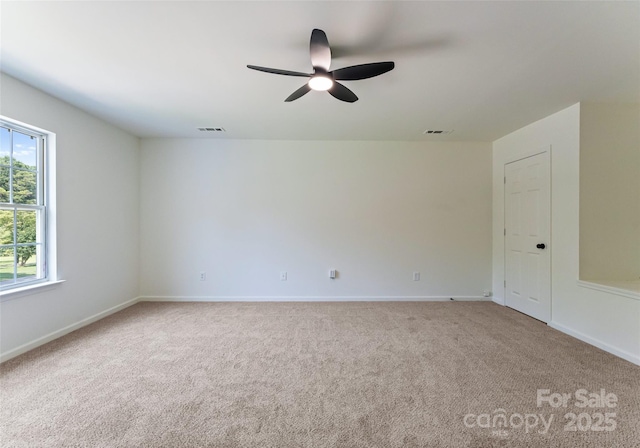 5229 Tarrywood Ln, Charlotte, NC 28205 - carpeted empty room with ceiling fan and baseboards