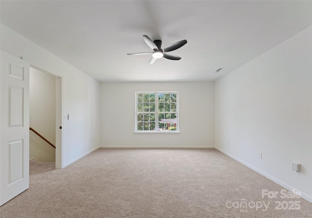 5229 Tarrywood Ln, Charlotte, NC 28205 - spare room with light carpet, ceiling fan, and baseboards