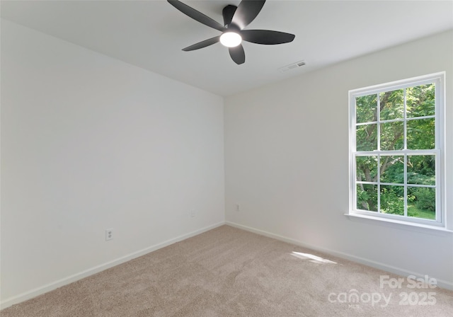 5229 Tarrywood Ln, Charlotte, NC 28205 - carpeted empty room with baseboards and a ceiling fan