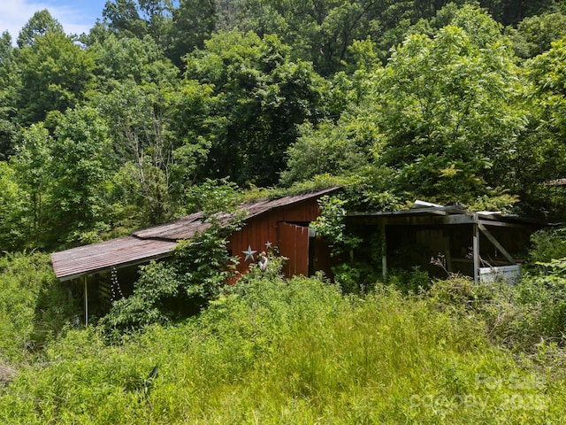 99 Bridges Cove Rd, Leicester, NC 28748 - view of pole building featuring a wooded view