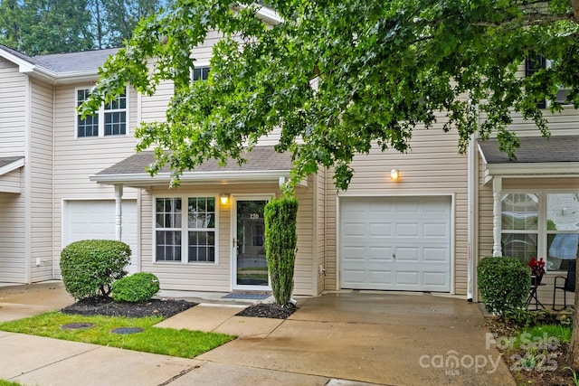 120 Alpine Ridge Dr, Asheville, NC 28803 - view of property featuring an attached garage, driveway, and a shingled roof