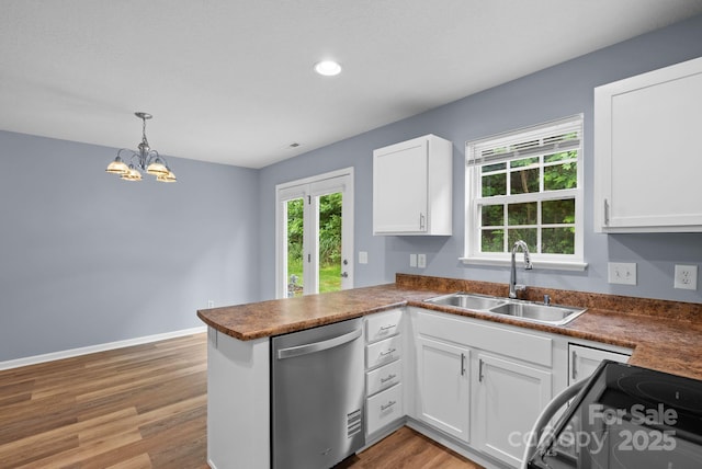 120 Alpine Ridge Dr, Asheville, NC 28803 - kitchen with stainless steel dishwasher, electric range oven, plenty of natural light, light wood-style flooring, and recessed lighting