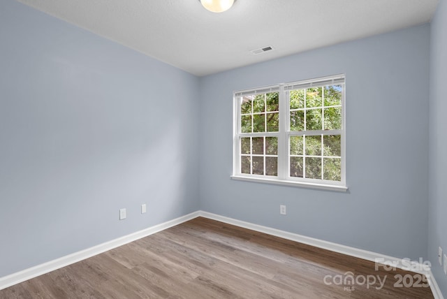 120 Alpine Ridge Dr, Asheville, NC 28803 - empty room featuring wood finished floors and baseboards