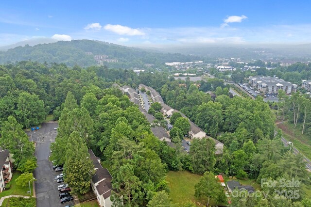 120 Alpine Ridge Dr, Asheville, NC 28803 - aerial view of property and surrounding area featuring a heavily wooded area