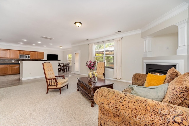 13622 Stringfellow Ln, Charlotte, NC 28278 - living area featuring crown molding, a glass covered fireplace, and recessed lighting