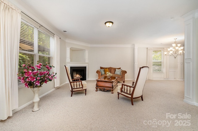 13622 Stringfellow Ln, Charlotte, NC 28278 - sitting room with carpet, plenty of natural light, a chandelier, crown molding, and a lit fireplace