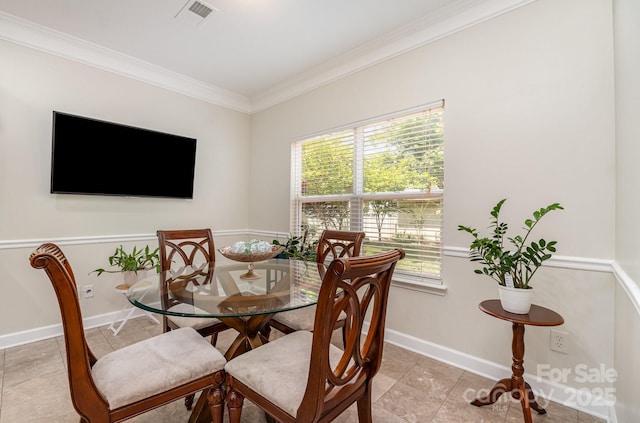 13622 Stringfellow Ln, Charlotte, NC 28278 - dining area with light tile patterned flooring and crown molding