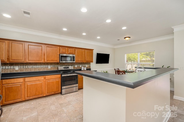 13622 Stringfellow Ln, Charlotte, NC 28278 - kitchen with stainless steel appliances, dark countertops, decorative backsplash, ornamental molding, and brown cabinets