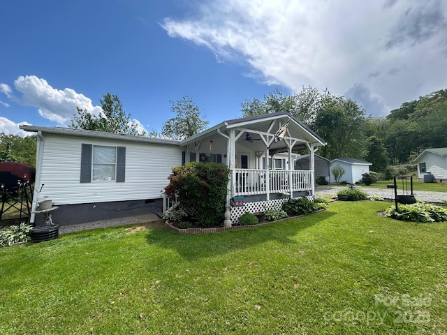 121 J F Morris Dr, Waynesville, NC 28786 - view of front of property featuring a porch, a front lawn, and crawl space