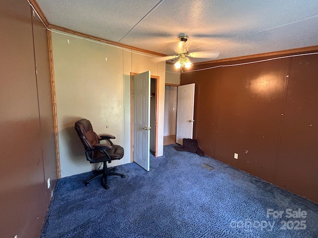121 J F Morris Dr, Waynesville, NC 28786 - unfurnished bedroom featuring a textured ceiling, carpet floors, and a ceiling fan