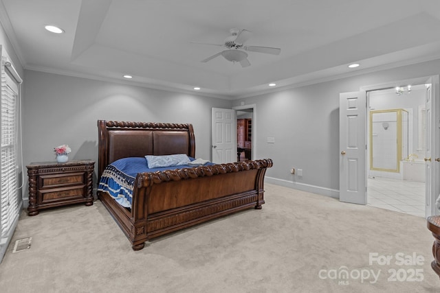 654 9th St N, Albemarle, NC 28001 - bedroom featuring carpet, recessed lighting, ornamental molding, a tray ceiling, and connected bathroom