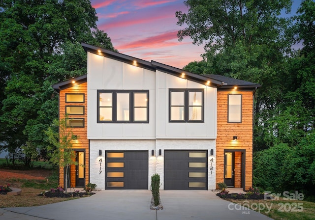 4117 Sarah Dr, Charlotte, NC 28217 - contemporary home with driveway and an attached garage