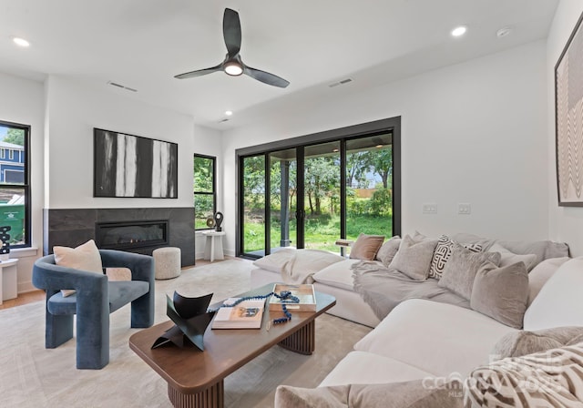 4117 Sarah Dr, Charlotte, NC 28217 - living room featuring recessed lighting, a ceiling fan, and a premium fireplace