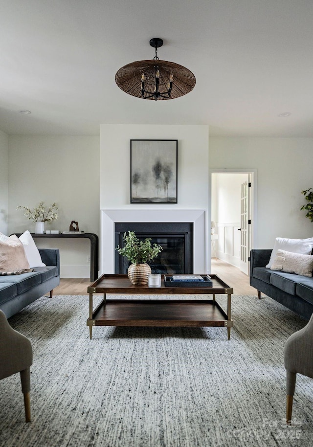 408 Ideal Way, Charlotte, NC 28203 - living area featuring a glass covered fireplace and wood finished floors