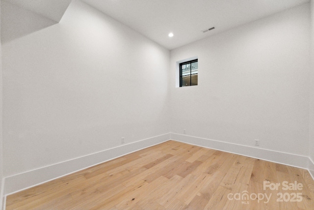 408 Ideal Way, Charlotte, NC 28203 - spare room featuring light wood-style flooring and recessed lighting