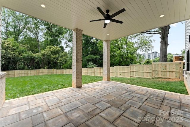 408 Ideal Way, Charlotte, NC 28203 - fenced backyard featuring a patio area and ceiling fan