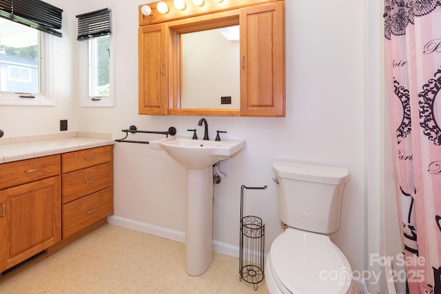 18 Gravely Branch Rd, Fletcher, NC 28732 - bathroom featuring toilet and a shower with shower curtain