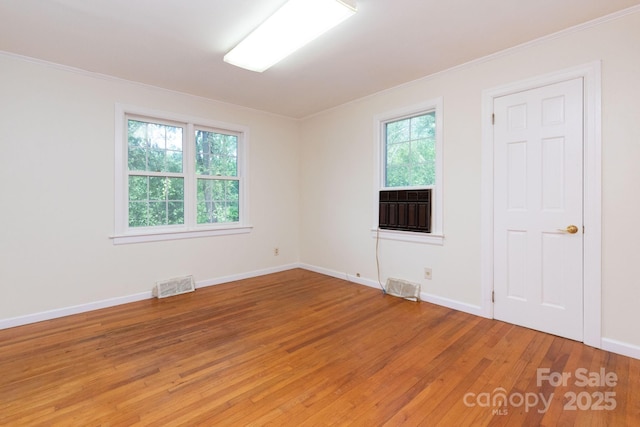 18 Gravely Branch Rd, Fletcher, NC 28732 - empty room with light wood-style floors and crown molding