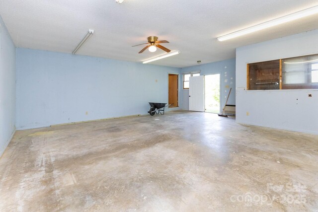18 Gravely Branch Rd, Fletcher, NC 28732 - unfurnished room featuring concrete floors and ceiling fan