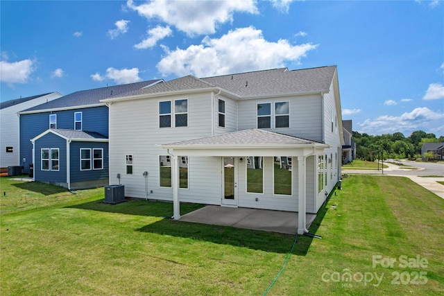 12009 Grinstead Ln Unit 303, Charlotte, NC 28278 - back of house with a patio area, central AC, and a yard