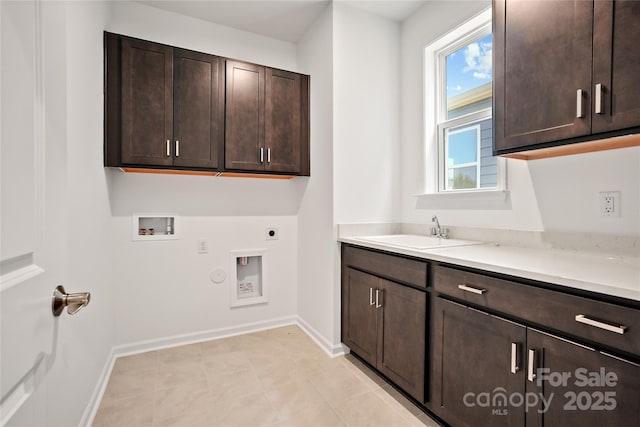12009 Grinstead Ln Unit 303, Charlotte, NC 28278 - laundry room featuring cabinet space, electric dryer hookup, hookup for a washing machine, hookup for a gas dryer, and baseboards