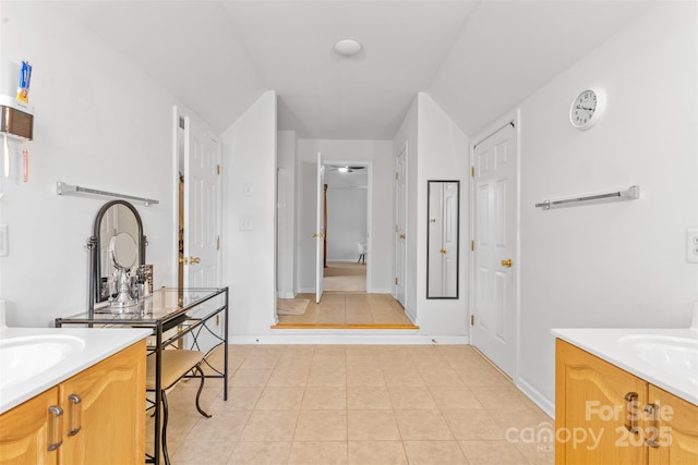 3213 Strawberry Rd, Matthews, NC 28104 - bathroom featuring two vanities and tile patterned flooring