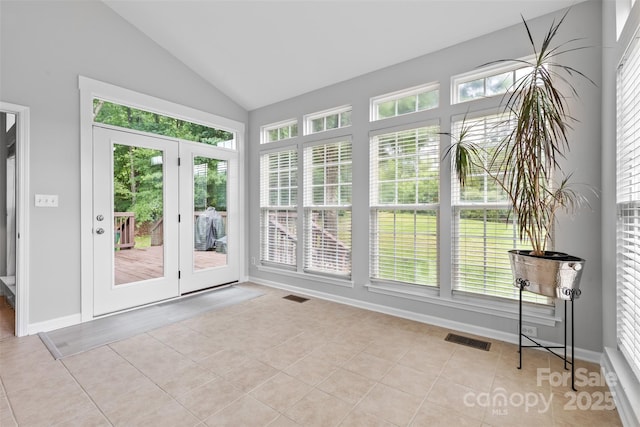 3213 Strawberry Rd, Matthews, NC 28104 - unfurnished sunroom with french doors, lofted ceiling, healthy amount of natural light, and tile patterned flooring