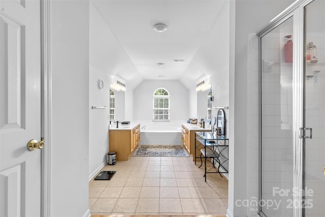 3213 Strawberry Rd, Matthews, NC 28104 - full bathroom with vanity, a bath, a stall shower, tile patterned flooring, and vaulted ceiling