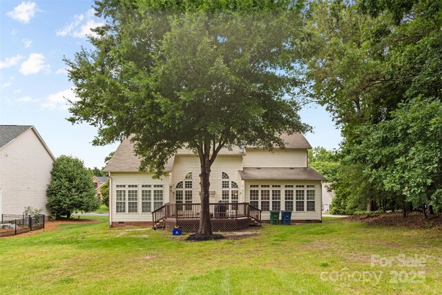 3213 Strawberry Rd, Matthews, NC 28104 - rear view of house featuring crawl space, a wooden deck, and a yard