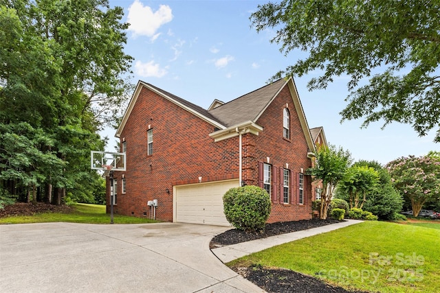 3213 Strawberry Rd, Matthews, NC 28104 - view of property exterior featuring brick siding, a lawn, concrete driveway, and an attached garage