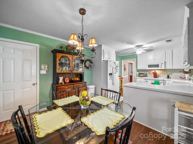 1634-B Union Rd, Gastonia, NC 28054 - dining space with ornamental molding, dark wood-style flooring, ceiling fan, wine cooler, and a chandelier