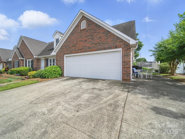 1634-B Union Rd, Gastonia, NC 28054 - view of front of property with brick siding, concrete driveway, a garage, and a shingled roof
