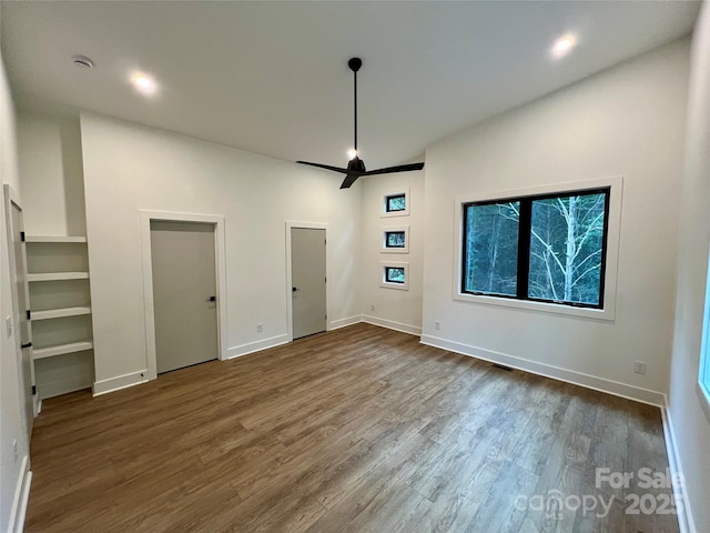 908 Apex Dr, Albemarle, NC 28001 - unfurnished living room with dark wood finished floors, a ceiling fan, and baseboards