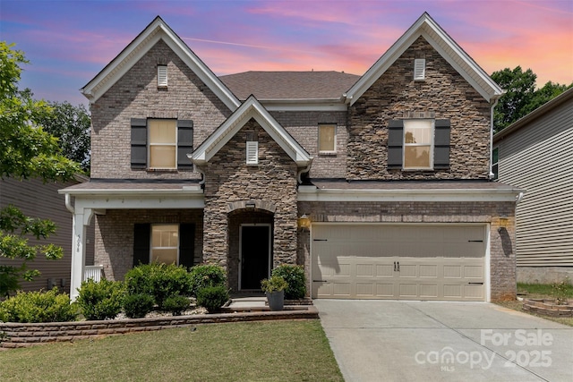 5098 Burnwald Ct, Fort Mill, SC 29715 - traditional-style house featuring driveway, an attached garage, a lawn, and stone siding