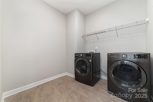 5098 Burnwald Ct, Fort Mill, SC 29715 - laundry area featuring washer and dryer and light tile patterned flooring
