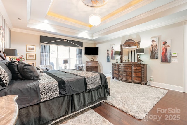 3441 Club Ridge Ct, Gastonia, NC 28056 - bedroom featuring a tray ceiling, wood finished floors, and ornamental molding