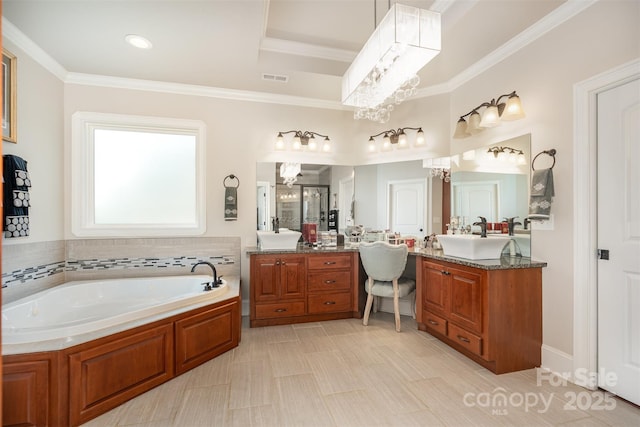 3441 Club Ridge Ct, Gastonia, NC 28056 - bathroom featuring a garden tub, two vanities, a shower stall, crown molding, and a chandelier