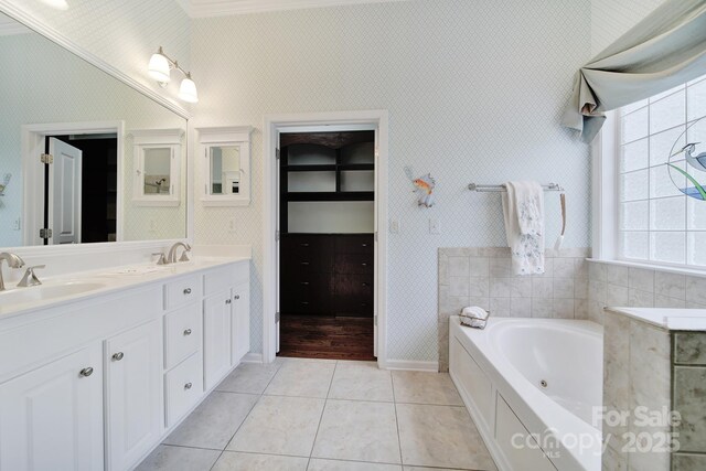 964 Knob Creek Ln, Fort Mill, SC 29708 - bathroom featuring wallpapered walls, double vanity, a whirlpool tub, crown molding, and tile patterned flooring