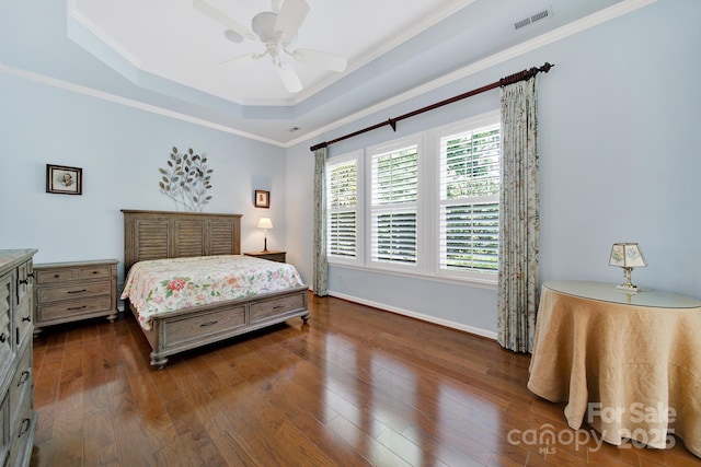 964 Knob Creek Ln, Fort Mill, SC 29708 - bedroom with a raised ceiling, ornamental molding, dark wood-style floors, and ceiling fan