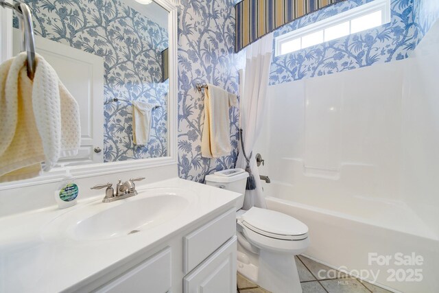 964 Knob Creek Ln, Fort Mill, SC 29708 - bathroom with wallpapered walls, vanity, shower / tub combination, and tile patterned flooring