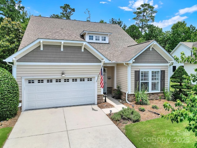964 Knob Creek Ln, Fort Mill, SC 29708 - view of front of home with roof with shingles, a garage, driveway, and stone siding