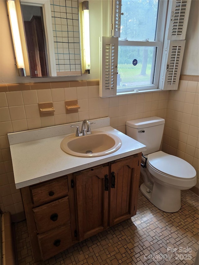 4298 NC-41 Hwy S, Fairmont, NC 28340 - bathroom with tile walls, vanity, and toilet